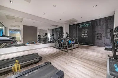 a gym with treadmills and exercise equipment in a room at Urban 2505 - Oasis with pool and gym in El Poblado
