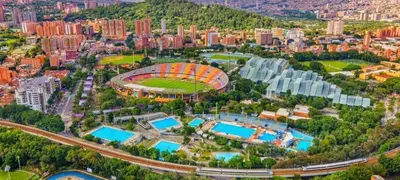 an aerial view of a baseball stadium and a city at Spacious Laureles Apt-Smart Lock-Queen Bed-AC in Medellín