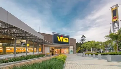 a store with a waze sign in front of it at Spacious Apt -Laureles -AC -Smart Lock- WiFi in Medellín