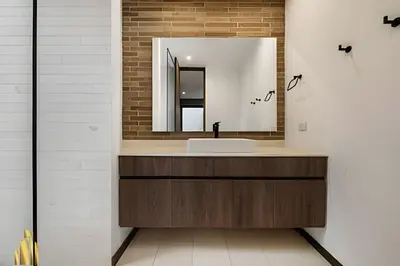 a bathroom with a sink and a mirror at C36 apto. 802 - Luminoso Dúplex con Vistas Panorámicas in Medellín