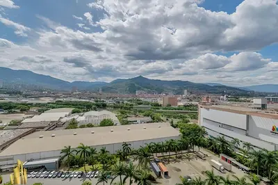 a view of a city with mountains in the background at Class 48 apto. 1503 - Tranquilidad moderna/Balcón priv in Sabaneta
