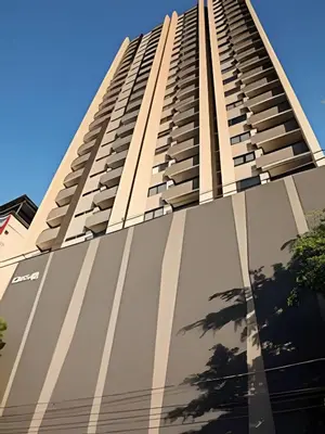 a tall building with a reflection of a tree at Class 48 apto. 1603 - Sophisticated apt/panoramic views in Sabaneta