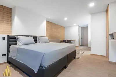a bedroom with a large bed in a room at Class 48 Apt 2201 - Apt en Sabaneta con balcón privado in Sabaneta
