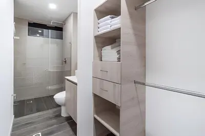 a bathroom with a toilet and a shower at Class 48 Apt. 2302 - Íntimo loft con balcón privado in Sabaneta