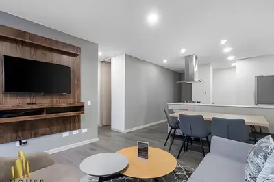 a living room with a couch and a table at Class 48 Apt. 2304 - Apto con balcón privado/Sabaneta in Sabaneta