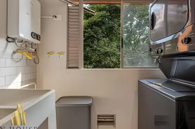 a kitchen with a sink and a window at La Mannuela 505 - Stylish Living in El Poblado in El Poblado