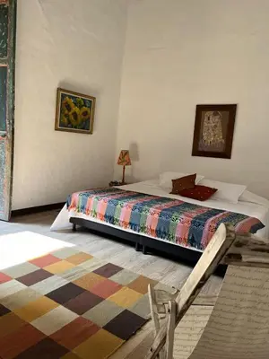 a bedroom with a bed in a room at Hotel Art Boutique Las Cardenas in Carolina del Principe