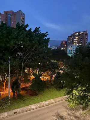 a view of a city street with trees and buildings at Apartamento con excelente ubicación, Laureles in Medellín