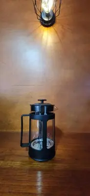 a black coffee pot sitting on top of a table at EmiliasHome Alojamiento amplio en Laureles in Medellín