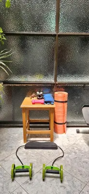 a small table with green wheels on a patio at EmiliasHome Alojamiento amplio en Laureles in Medellín