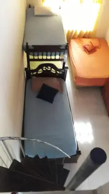 an overhead view of two beds in a room at Finca Villa Palma in Barbosa