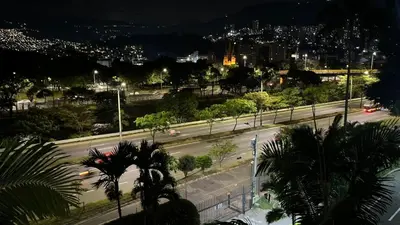 a view of a city street at night at Mirador pueblito Paisa-Tipo loft in Medellín
