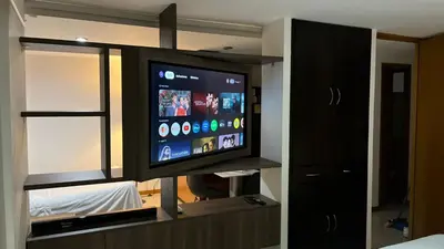 a flat screen tv in a room at Mirador pueblito Paisa-Tipo loft in Medellín