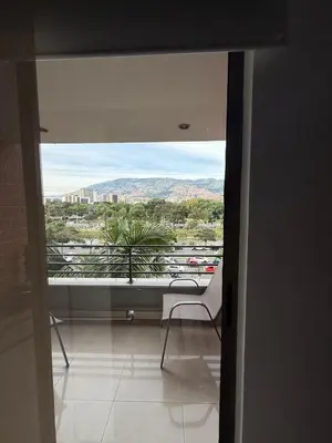 a view of a balcony with a chair in a room at Mirador pueblito Paisa-Tipo loft in Medellín