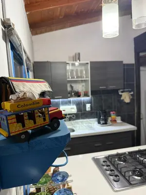 a toy truck sitting on a counter in a kitchen at El Refugio in Copacabana