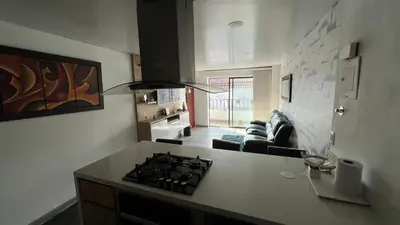a kitchen with a stove top in a room at Apartamento Simón Bolívar in Itagüí