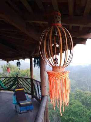 a chandelier hanging from the roof of a house at Shiva's Temple in San Carlos