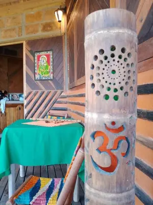 a room with a table with a green table at Shiva's Temple in San Carlos