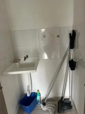 a bathroom with a white sink and a sink at Central, Universidades y Centro Comercial in Manizales