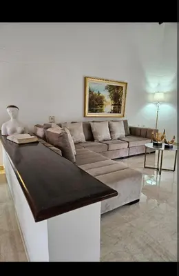 a living room with a couch and a table at Casa de campo El Jaguar in San Jerónimo