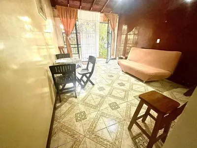 a living room with a couch and a table at Apartamento en Belén la palma medellin in Medellín