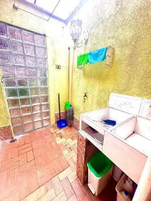 a bathroom with a sink and a shower in a room at Apartamento en Belén la palma medellin in Medellín
