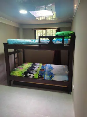 a couple of bunk beds in a room at El descanso perfecto in Palestina
