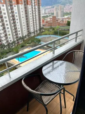 a table and two chairs on a balcony with a view at Luxurious Stay 2 in Bello