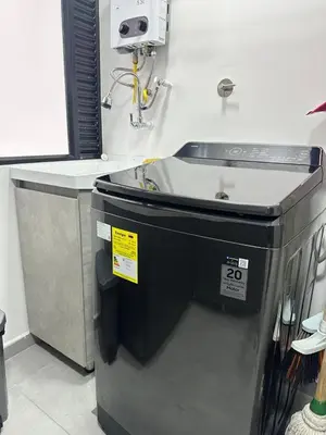 a sink in a room with a counter and a sink at A home away from home! in Medellín