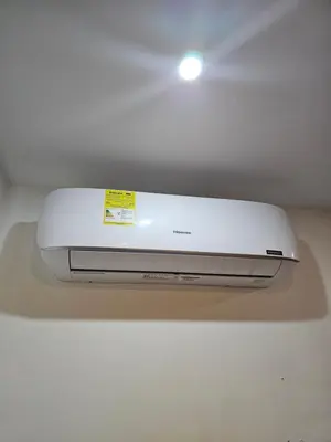 a white printer sitting on top of a table at Moderno & Central, descubre medellin desde Laureles in Medellín
