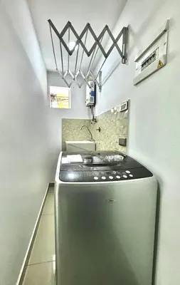 a kitchen with a stainless steel refrigerator and a sink at Apartamento Acogedor y Tranquilo in Sabaneta