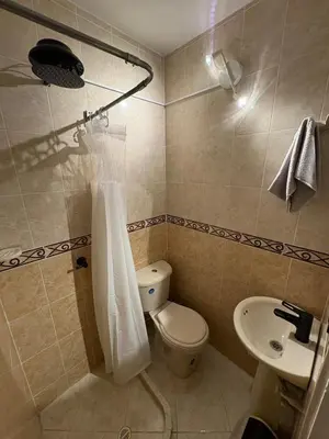 a bathroom with a toilet and a sink at Apartamento en centro de Medellín in Medellín