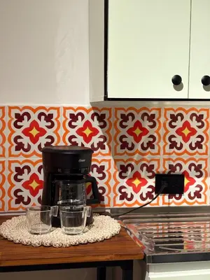 a coffee maker sitting on a counter in a kitchen at Apartamento en centro de Medellín in Medellín