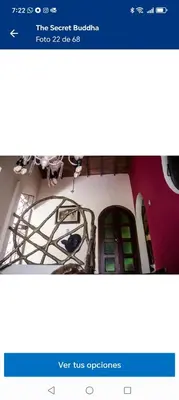 a page of a website with a picture of a stove at Artsy lush villa with jungle garden in the city in La Estrella