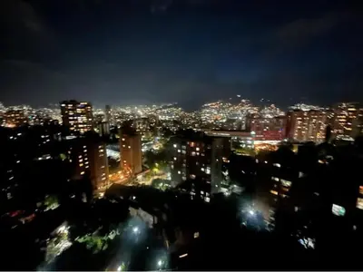 a view of a city at night with lights at Loft en Medellin El Poblado Vista espectacular in Medellín