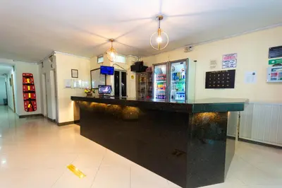 a large black bar in a room at Hotel Villa Real 70 Laureles in Medellín