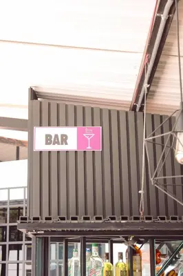 a bar sign on the front of a building at Hotel Curazao Natural Living cerca a charcos naturales y tobogán extremo in Cocorná