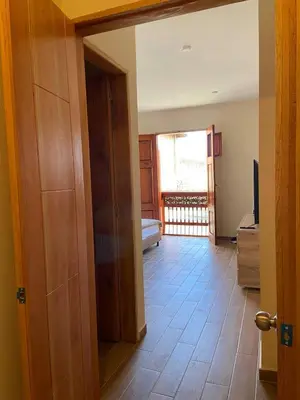 an open door to a room with a view of a living room at Casa Colonial Jericó - Casa Romo in Jericó