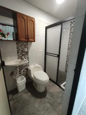 a small bathroom with a toilet and a sink at Casa Finca La Magdalena Pool and Warm Climate in Sopetran