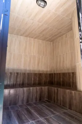 a sauna with wooden walls and a ceiling at Hotel Boutique Lomas Colonial in Santa Fe de Antioquia