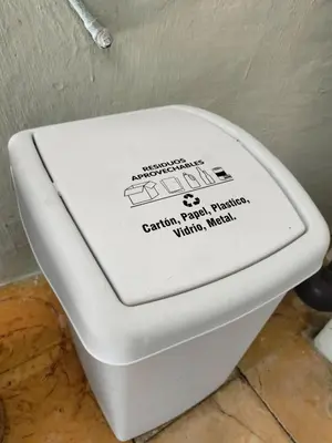 a toilet with a sign on the top of it at Casa Rosa de los Vientos in oak forest in Medellín