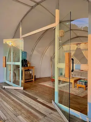 a room with a tent with a bed in it at Moonshine - Sereno Glamping in Manizales