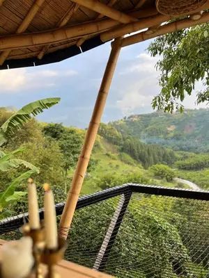 a balcony with a view of a mountain at Leaf House - Sereno Glamping in El Tablazo