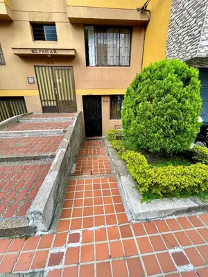 a brick walkway in front of a building at laureles zona turistica estadio cerca poblado aire acondicionado in Medellín