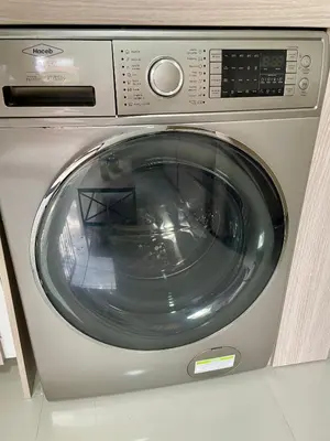 a washing machine is sitting in a kitchen at laureles zona turistica estadio cerca poblado aire acondicionado in Medellín