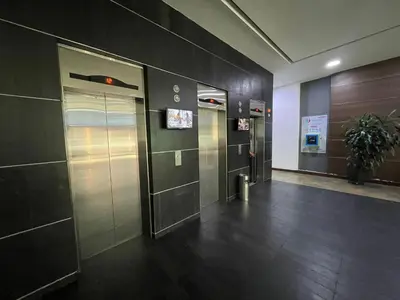 a hallway with two elevators in a building at Premium Studio near Oviedo Mall, El Poblado- Balcony, AC & Fast WiFi in Medellín