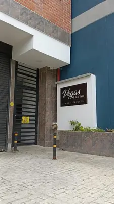 a building with a sign on the side of it at Acogedor apto in Sabaneta