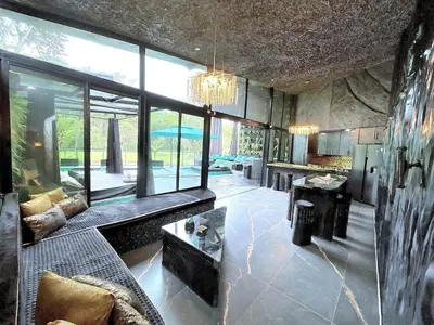 a living room with a couch and a table at Luxury Villa Eleven Eleven in San Rafael