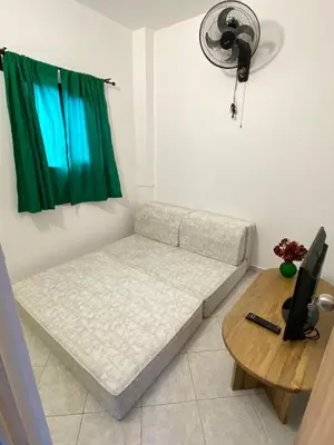 a living room with a couch and a table at Apartmento a una cuadra del aprque principal in San Rafael