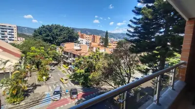 a view of a city from a balcony at Tu espacio cómodo, elegante y céntrico con balcón 401 in Medellín